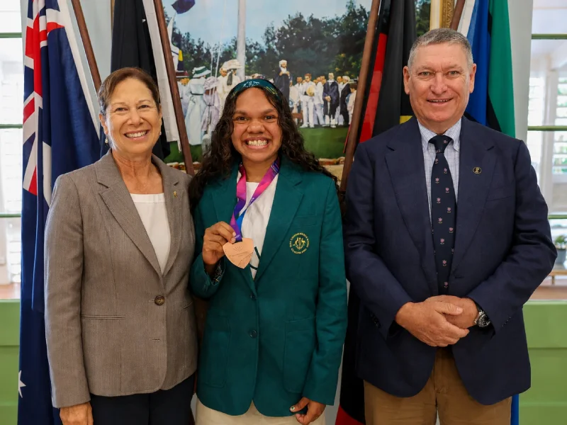 The Administrator and Ms Sue Brosnan OLY welcome rising para-athlete star Miss Briseis Brittain to Government House.